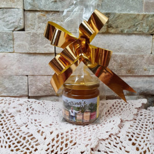 Honig mit goldener Schleife